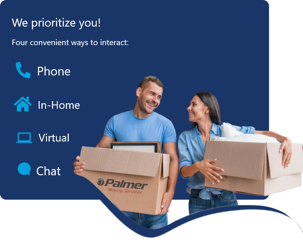 A couple smiling and holding Palmer Moving Services boxes full of their belongings